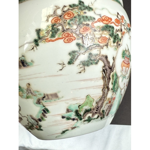 560A - A Chinese famille vert jardiniere with painted decoration of men fishing, trees, landscapes etc. dia... 