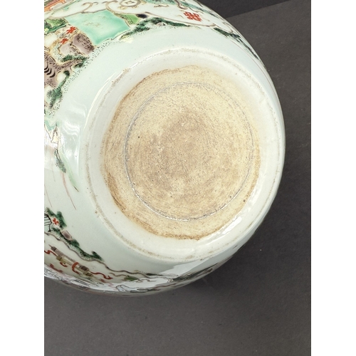 560A - A Chinese famille vert jardiniere with painted decoration of men fishing, trees, landscapes etc. dia... 
