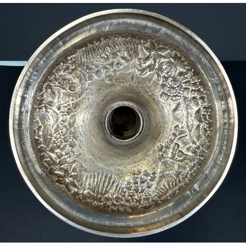 601 - A large late 19th century Indian white metal two-handled pedestal trophy cup with extensive relief d... 