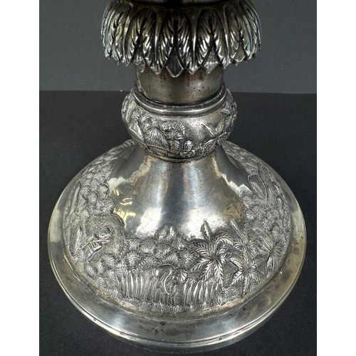 601 - A large late 19th century Indian white metal two-handled pedestal trophy cup with extensive relief d... 