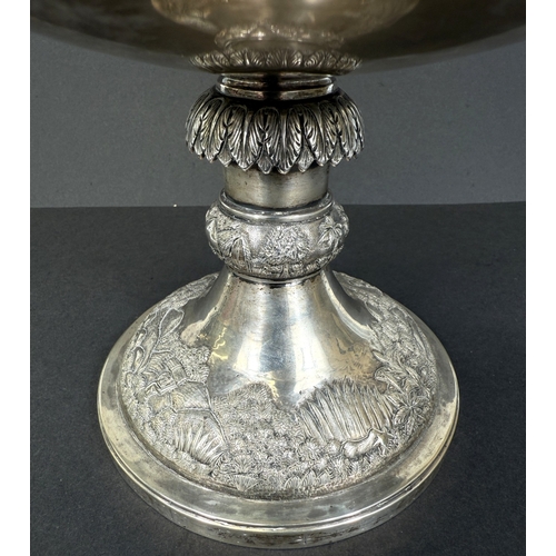 601 - A large late 19th century Indian white metal two-handled pedestal trophy cup with extensive relief d... 