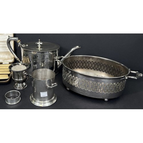 606 - A selection of silver plated items, teapot, basket and others; a collection of silver plated cutlery... 