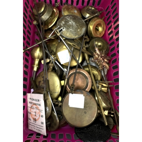 611 - A selection of mantle clock pendulums and watch parts