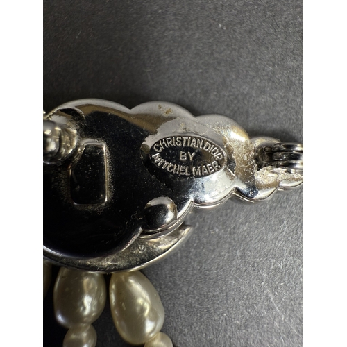 621 - Vintage Christian Dior, designed by Mitchel Maer, circa 1950's - a brooch in the form of a diamanté ... 