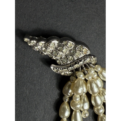 621 - Vintage Christian Dior, designed by Mitchel Maer, circa 1950's - a brooch in the form of a diamanté ... 