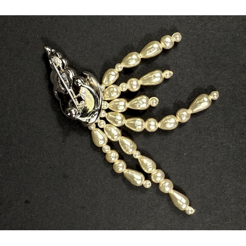 621 - Vintage Christian Dior, designed by Mitchel Maer, circa 1950's - a brooch in the form of a diamanté ... 