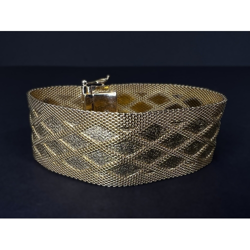623A - Christian Dior Grosse 1967 woven gold turned mesh cuff bracelet with raised diamond design, maker's ... 