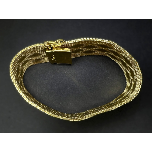 623A - Christian Dior Grosse 1967 woven gold turned mesh cuff bracelet with raised diamond design, maker's ... 