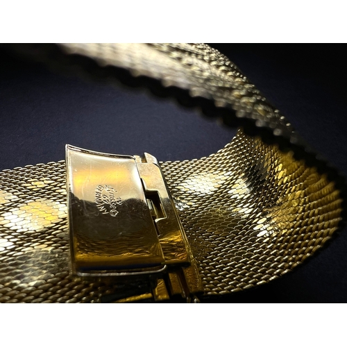 623A - Christian Dior Grosse 1967 woven gold turned mesh cuff bracelet with raised diamond design, maker's ... 