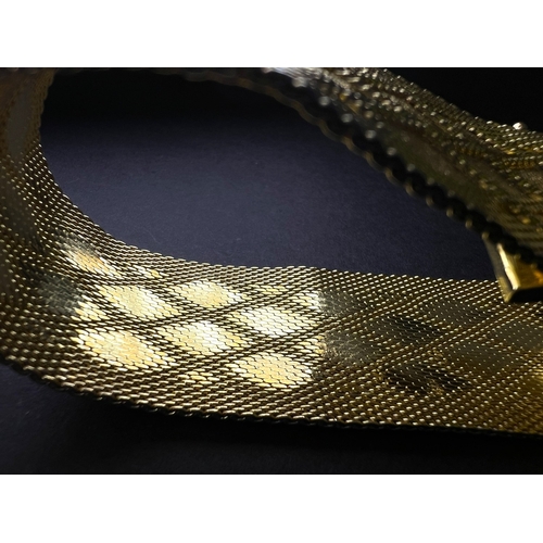 623A - Christian Dior Grosse 1967 woven gold turned mesh cuff bracelet with raised diamond design, maker's ... 