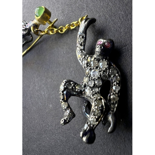 630 - A Victorian design novelty brooch of 2 monkeys, one seated, the other suspended on a chain, diamond ... 