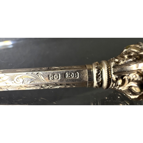 631 - A yellow metal chased and engraved propelling pencil with seal top, stamped 