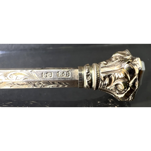 631 - A yellow metal chased and engraved propelling pencil with seal top, stamped 