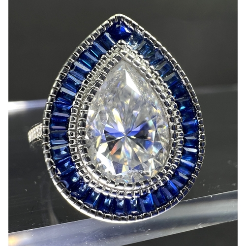 636 - A modern dress ring in the Art Deco style set with central moissanite stone 0.5ct on shank stamped 9... 