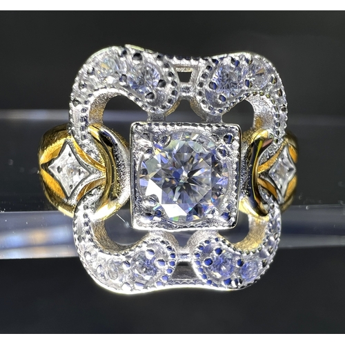 636 - A modern dress ring in the Art Deco style set with central moissanite stone 0.5ct on shank stamped 9... 