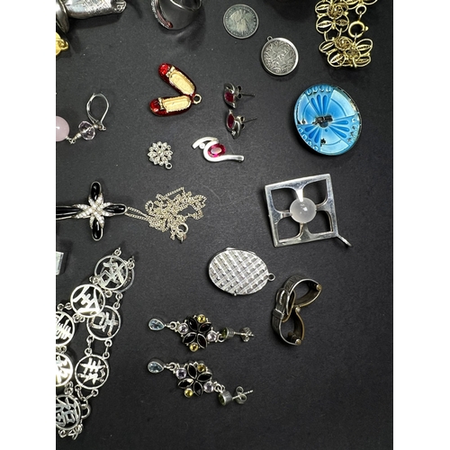 642 - A collection of silver, white metal and gilt costume jewellery, enamel brooches etc approx 211gms we... 