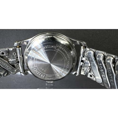 644 - A mid 20th century Mido wristwatch with pink dial, stainless steel case