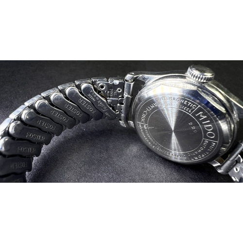 644 - A mid 20th century Mido wristwatch with pink dial, stainless steel case