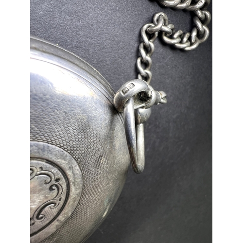 645 - A Heavy hall marked silver cased verge movement open face pocket watch with part Albert chain