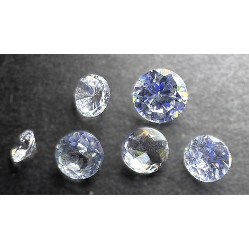 650 - A selection of cut and other stones in a variety of colours, untested.