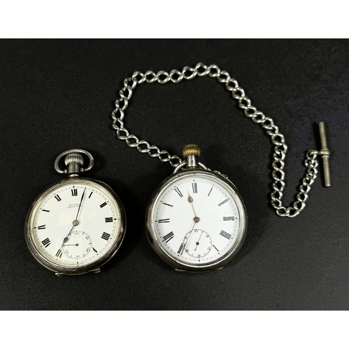651 - Two silver cased keyless open faced gents pocket watches, one with chain.