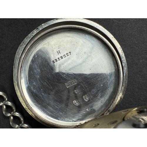 651 - Two silver cased keyless open faced gents pocket watches, one with chain.