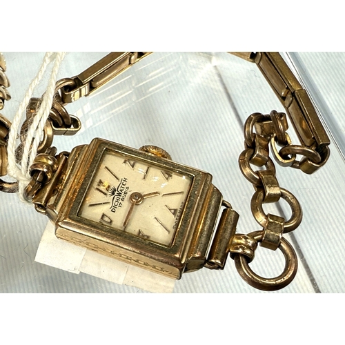 653 - 4.9ct hallmarked gold ladies wristwatch and 2 gold plated ladies wristwatches.