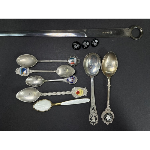 677 - An enamel Scandinavian teaspoon, medal and dress medal, wind-up mouse etc.