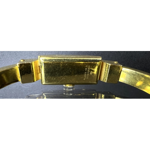680 - A ladies Boucher dress wristwatch in gilt with turquoise enamel decoration