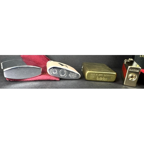683 - A Ronson Pocket Princess Poodle Dog lighter in pink, Ronson Hurricane another Roson and a Zippo ligh... 