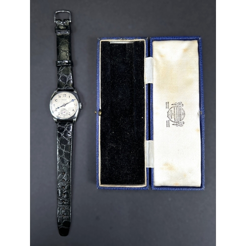 684 - A 1930's gents cushion shaped Henderson's wristwatch with Arabic numerals, seconds dials with Hender... 