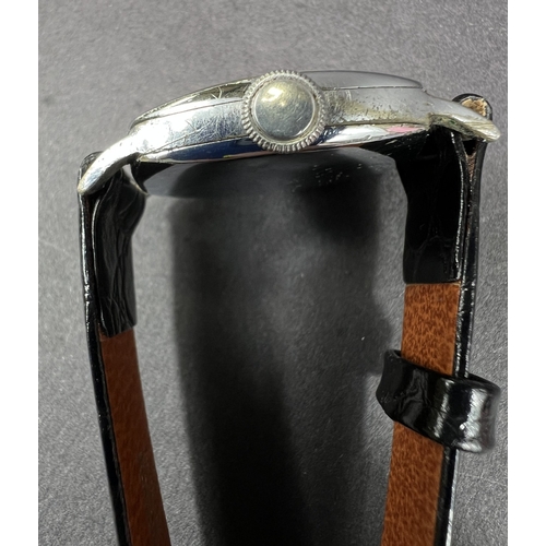 684 - A 1930's gents cushion shaped Henderson's wristwatch with Arabic numerals, seconds dials with Hender... 