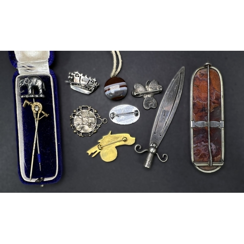 688 - An early 20th century Jumbo elephant stick pin, other costume including white metal and minerals etc