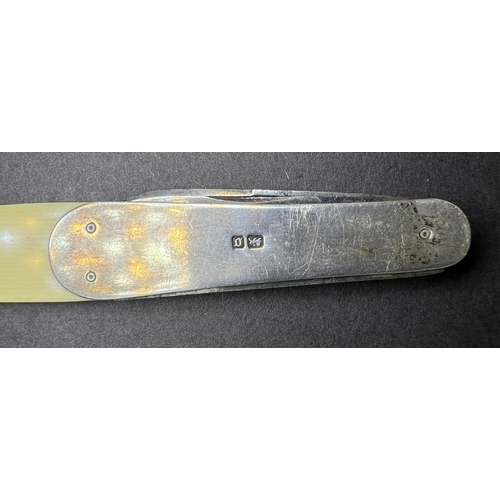 688A - A vintage Advertising 'The Motor' letter opener with hall marked silver handle and ivorine blade