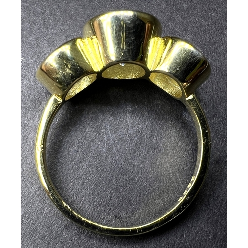 689 - A modern dress ring with 3 large moissanite stones (approx. 4ct total) in gold plated setting stampe... 