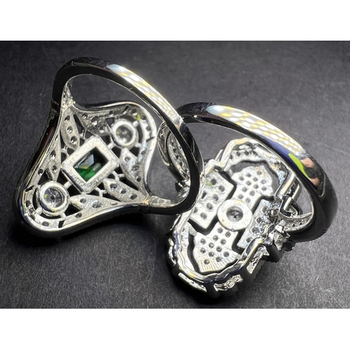 690 - Two Art Deco style costume diamanté dress rings; a silver tone diamanté necklace