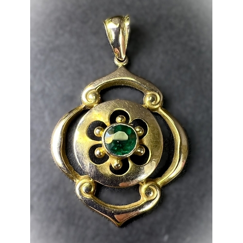 700 - An Edwardian 9ct gold pendent set with green stone, possibly tourmaline.  1.6gms