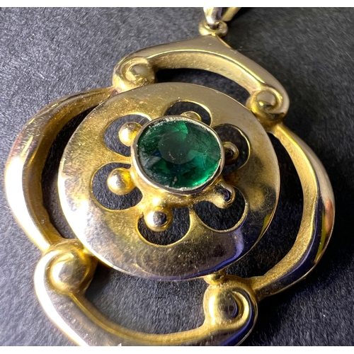700 - An Edwardian 9ct gold pendent set with green stone, possibly tourmaline.  1.6gms