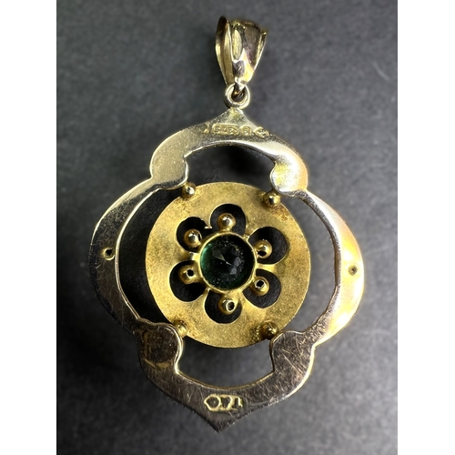 700 - An Edwardian 9ct gold pendent set with green stone, possibly tourmaline.  1.6gms