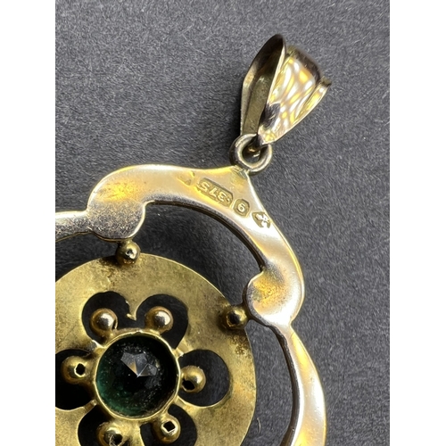700 - An Edwardian 9ct gold pendent set with green stone, possibly tourmaline.  1.6gms