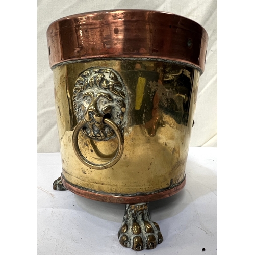 71 - A large copper tea urn with floral and leaf decoration, ht. 57cm and a small copper and brass plante... 