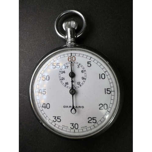 712 - Two silver cased open faced pocket watches and a vintage stopwatch