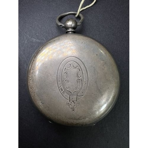712 - Two silver cased open faced pocket watches and a vintage stopwatch