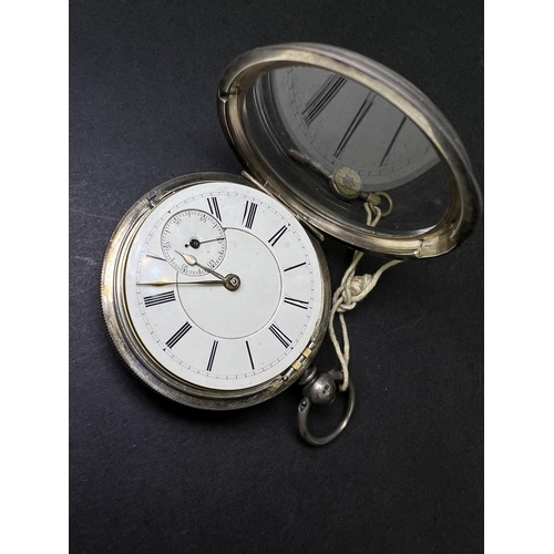 712 - Two silver cased open faced pocket watches and a vintage stopwatch