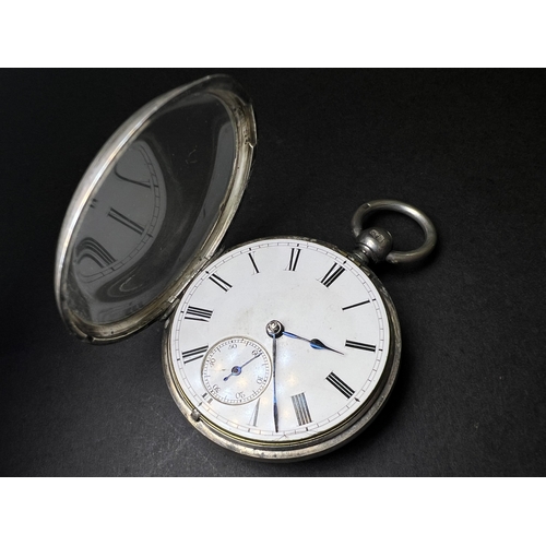 712 - Two silver cased open faced pocket watches and a vintage stopwatch