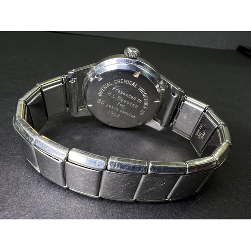 713 - A mid 20th century P. Buhre steel cased gents watch, dedication to the reverse