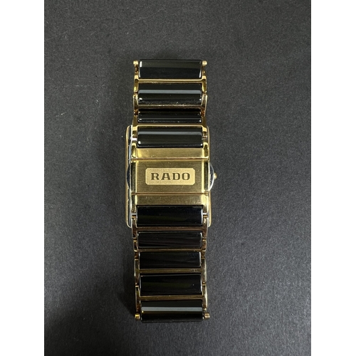714A - A Rado Jubile two tone wristwatch with box and paper