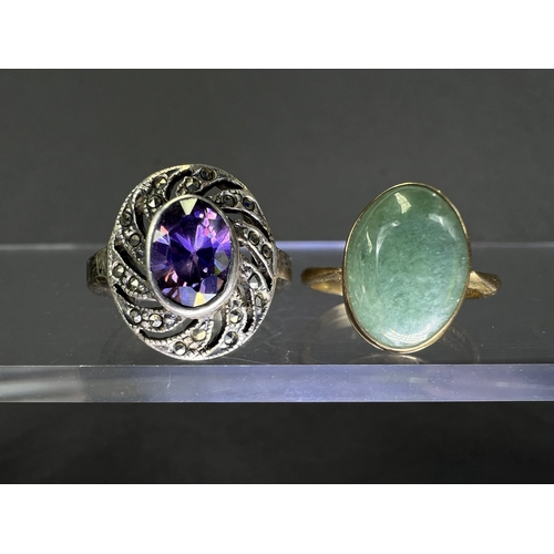715 - A gents 9ct gold ring set with jade coloured stone and a white metal dress ring