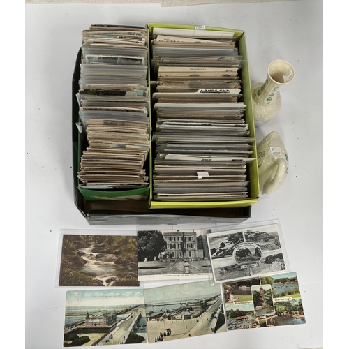 71B - A Belleek Swan and vase; a large selection of unmounted postcards