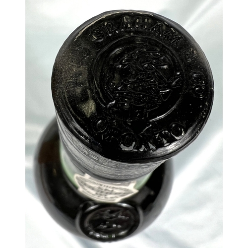 726 - A 75cl bottle of W & J Graham's Port - More Than 40 Years of Age Tawny, in wooden presentation b... 